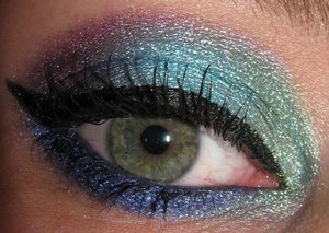 All Virus Insanity eyeshadows from www.virusinsanity.com

From inner to outer corner:
Emerald Green, Soft Waters, Punky Purple

Bottom eyeliner:
Navy Brat