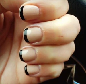 Nude and black French manicure