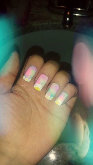 Pastels with a tyedye look and daisies on the tips :)