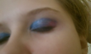 blue, purple, and pink. with black khol eyeliner.