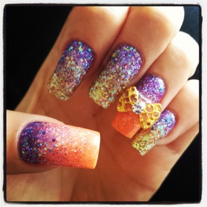 Purple, gold & orange glitter faded nails with gold bow :) done by alisha owens as always?