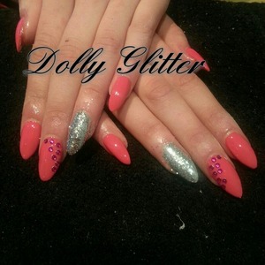 pink stiletto nails.
