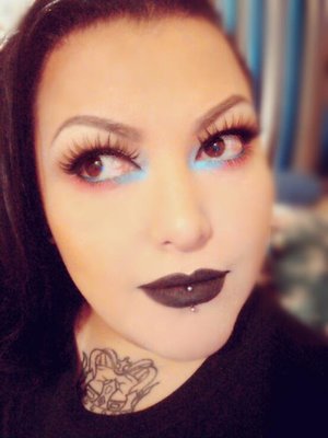 A fun twist on a Gothic look by playing it up with a pretty baby blue, a soft pink, and a blue to white over waterline. 