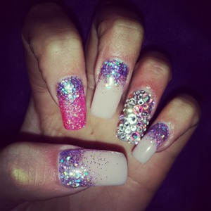 Swarovski crystal nails with glitter and nude acrylic