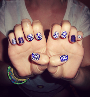 purple tribal nails with a little sparkle (: