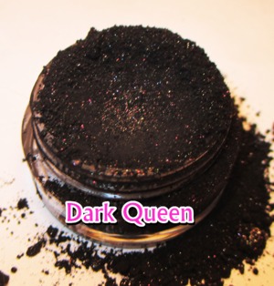 Dark Queen is a super black eyeshadow pigment with a hint of gold shimmer and pink and diamond sparkles all throughout. There's so much color shifting going on in this pigment that will keep your look sparkly and gorgeous all day long. Apply wet for a more intense black. Safe for eyes, lips, nails and face.