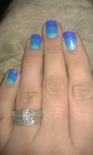 Blue ombre nails.