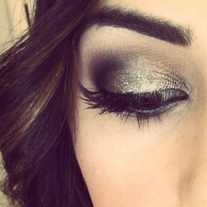 Watch the tutorial on my blog where I also mention the products used: http://leadingladymakeup.com/2012/12/30/new-years-eve-makeup-sparkly-smoky-eyes/