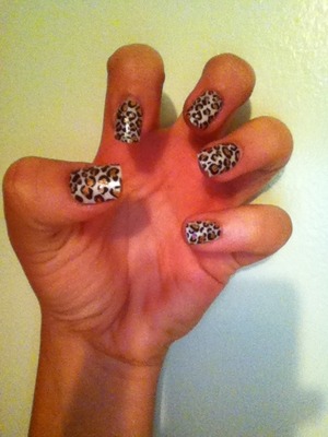 Easy and simple! Got kiss press on nails and decorated them myself with some Sally Hanson nail polish! 