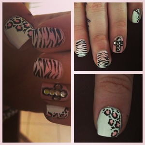 New nails tiger stripes. Leopard print and gem cross 