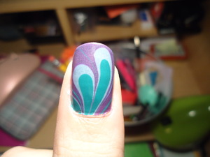 marbling- i wanted to try diff. "patterns" on each nail due to curiosity ^^- the colors are pretty ugly though :/