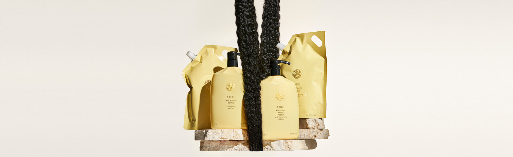 Shop the Liter and Refillable Sizes of the Oribe Hair Alchemy Shampoo and Conditioners