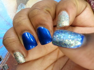 blue and multi color flex in silver glitter prom nails :)