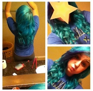 Teal and purple curls with a straightener 