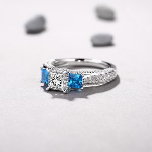Princess Cut Aquamarine & White Sapphire S925 Three-Stone Engagement Rings Found at https://www.lajerrio.com/princess-cut-aquamarine-white-sapphire-s925-three-stone-engagement-rings-600029.html