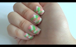 Hi! These is my fishtail braided nails (: I really like the design. I felt that it was a little messy though. I chose these colors because they seem so spring-like! I have a video on this (: