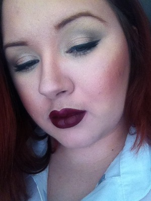 Smoked out winged liner and cherry bomb lipstick by wet n wild.