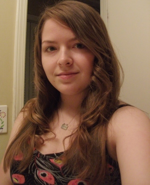 I curled my hair after seeing Mandy K.'s video of how to get loose curls. I just used some heat protectant spray, a conair 1" curling iron, and some Aqua Net hairspray :) 