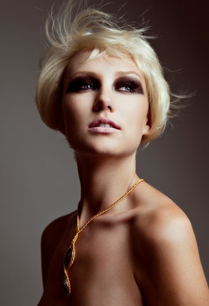 Extended bold smokey eye look. Foundation is MUFE, eyes and lips MAC.
Photographer: Benjo Arwas