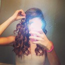 Curled hair with wand .