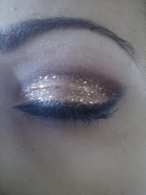 Cut crease brown/gold glitter with green liner on lower lashline