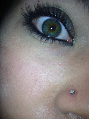 Not much makeup...just some mascara eyeliner and glitter...but my eye looks soo cool in this pic haha xD