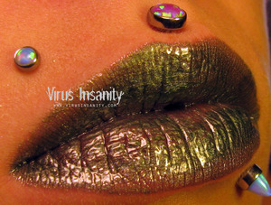 Virus Insanity Lipgloss, Rotten Kisses.
http://www.virusinsanity.com/#!lipglosses/vstc9=all-lipglosses/productsstackergalleryv29=2