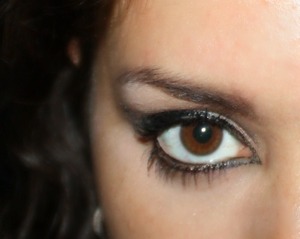 Bold eye liner and soft double wing