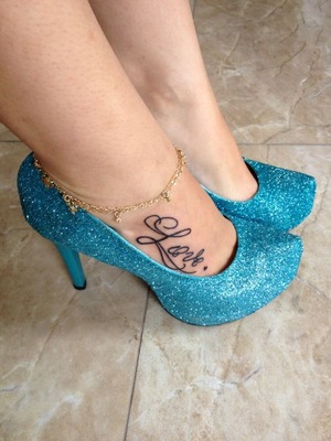 Tattoo and shoes.