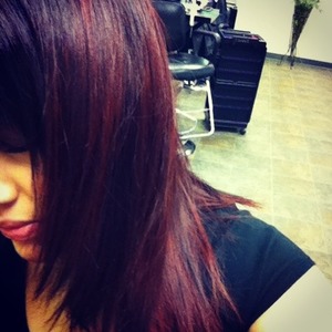 
Red hair color with black regrowth - nice ombré when it grows out! 

