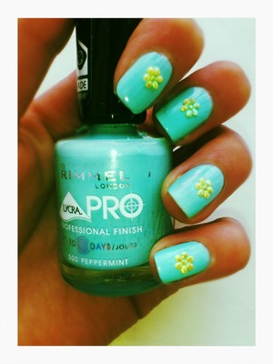 Mint blue nails and yellow flowers perfect for Spring<3