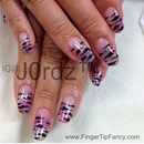 Zebra on pink, silver, and purple nails 