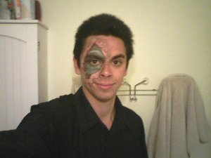 You can hardly see this, but this is a Halloween work I did a few years ago for a friend. I used liquid latex, toilet paper, fake blood, loreal foundation and eyeshadow to make it look like his skin had been ripped off. Probably one of the coolest things I've ever done but I can't find the good photo of it D;