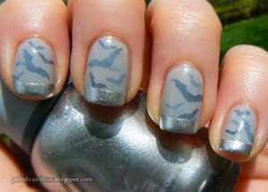 For the This Is Halloween Nail Art Challenge: Bats. This is a bat sammich! (A jelly sandwich with bats instead of glitter).

Blog post: http://polishrainbow.blogspot.com/2012/10/this-is-halloween-nail-art-challenge_18.html