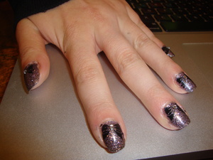 New China Glaze CG In The City from the Metro collection, with black Konad bows and square rhinestones.
