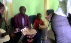 zi plays drums in church.3GP