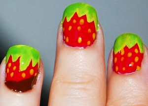 Strawberries W/Melted Chocolate Nails 
Tutorial: http://www.youtube.com/watch?v=VHGQw7cexUc
-I used: base coat, red, yellow, lighter green, darker green, brown, top coat. For especific brands/names please watch my tutorial.