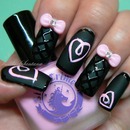 Lime crime / venique /  black matte  manicure with pink hearts  and pink bow