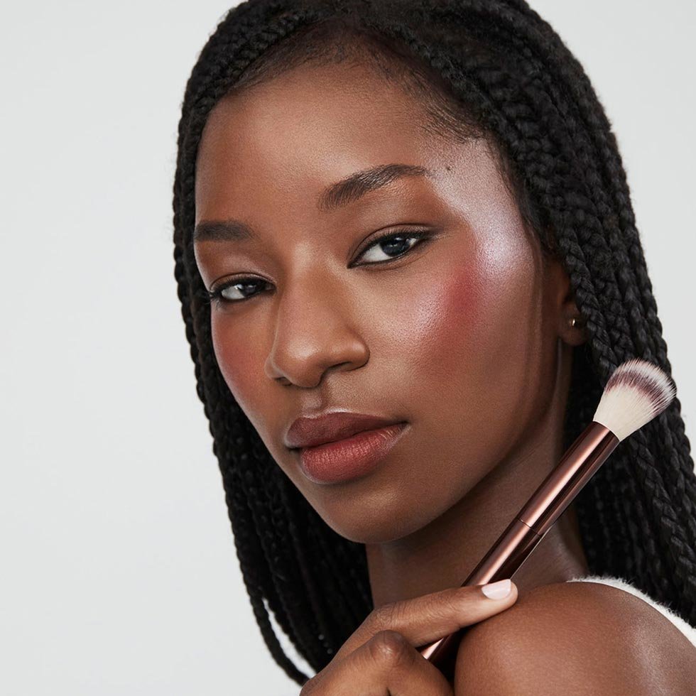 Model holding Hourglass No.15 Blush Brush