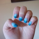 Blue glittery gradient nails
