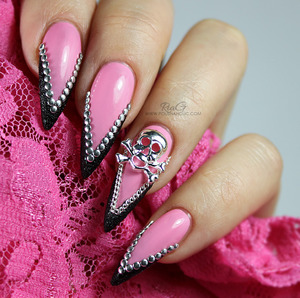 Edgy nail art done with Born Pretty Store studs and chain, OPI Chic From Ears To Tail and OPI Liquid Sand Emotions