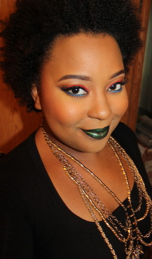 Fiery Red Pigment, Shimmered Gold, and a bold Blue Liner completes a beautiful stunning eye for a Jill Scott concert!