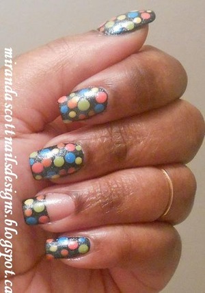With this manicure I used Sally Hansen Black Out for the base colour. And for the variation of polka dot colours I used Wet n Wild Club Havana, Sally Hansen Mellow Yellow,Green With Envy,Coral Reef and Blue Me Away. I also used Essie Pure Pearlfection for a slight shimmery top coat. 