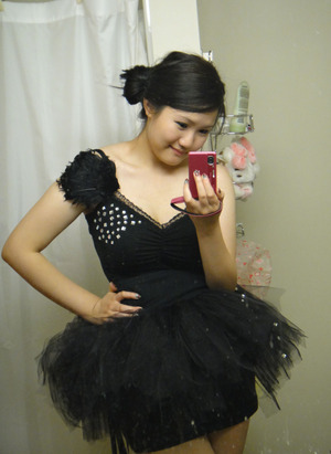 black swan costume: handmade tutu (layered on top of a talula black skirt), dynamite black lace tank top with square/circle jewel stickers from michaels and black feather (michaels) pinned on the strap