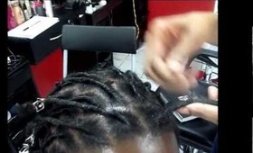 Retwisting Dreads at Norkobe's (stylist Strawberry)