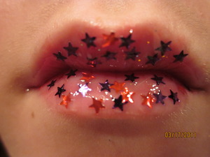 i put lip gloss on and than iput stars on it lol :)