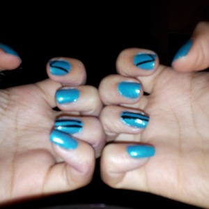 blue nails with stripes.