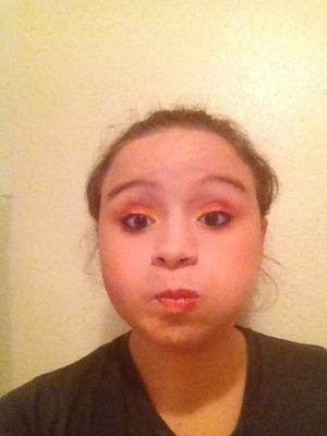 Orange circus makeup.