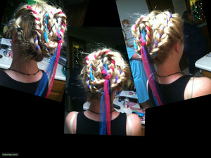 My friend did my hair she said she was thinking about the hunger games when she did it so it's kinda themed from that. personally i'm not one for updos but this one i kinda like(: