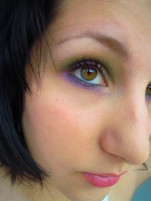Some green in the crease, a light purple eye liner, and purple under the eye! I based this make up on the colors from the comic book!